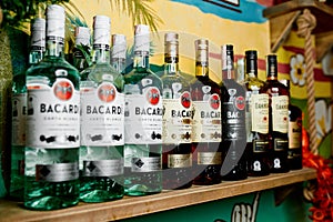 Many bottles of rum `BACARDI`