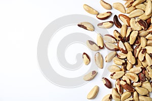 Many brasil nuts and space for text on white background