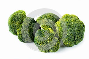 Many broccoli cabbage branches on white background.