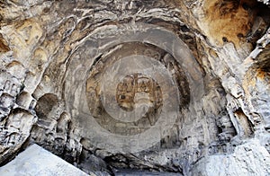 Many of the Buddha statues carved in the cave of the rock
