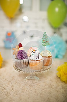 Many Capcakes with New Year`s decor