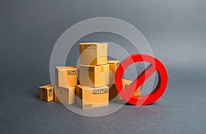 Many cardboard boxes and a red symbol NO. Embargo, trade wars. Restriction on the importation of goods, proprietary for business. photo