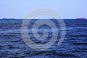 Many Cargo Ships on the Atlantic Ocean