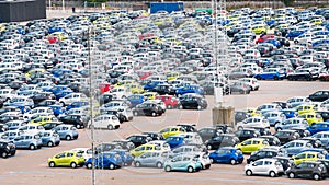 Many cars in parking lot in copenhagen harbor