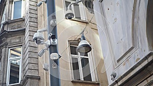 Many CCTV security cameras operating on buildings