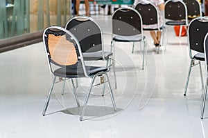 Many chairs for customers to order food and wait to take home inside of department store closed due to the corona virus Covid-19