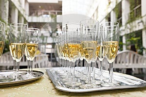many of the champagne glasses on the table