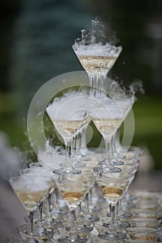 Many champagne glasses on the wedding table