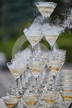 Many champagne glasses on the wedding table