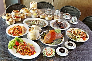 Many chinese food on table