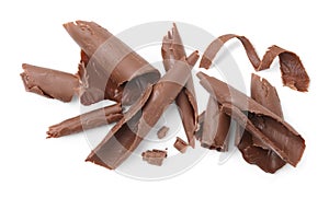 Many chocolate curls isolated on white, top view