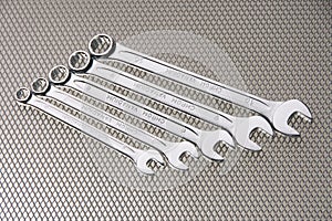 Many chrome-plated wrenches for mechanics