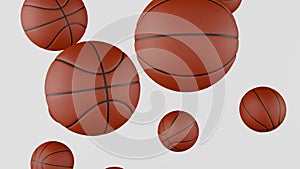 Many classic Basketball balls falling down on white background.