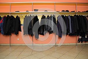 Many clothes in cloakroom
