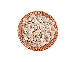 Many coffee beans in brown wood basket top view isolated on white background ,clipping path