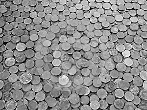 Many coins on floor of temple for lucky. Finance concept. Money background-black and white:selective focus