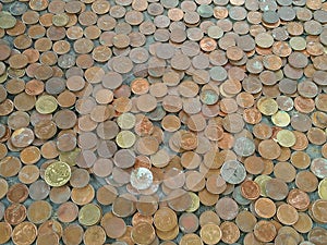 Many coins on floor of temple for lucky in Thailand, Money background