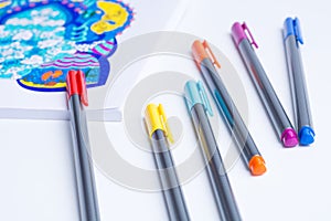 Many color fine liners on white background