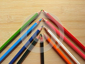 Many color pencils arranged