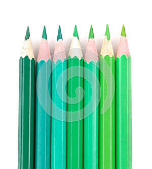 Many color pencils on white isolated background. close-up. stationery