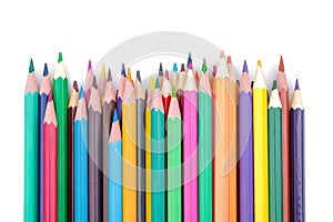Many color pencils on white isolated background. close-up. stationery. Office tools