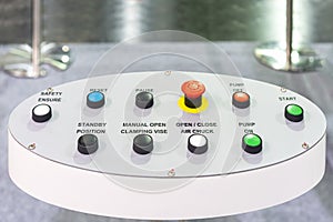 Many color push button function on control panel of manufacturing machine in industrial