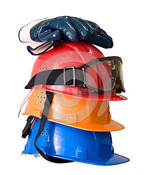 Many colored hardhats, gloves and goggles