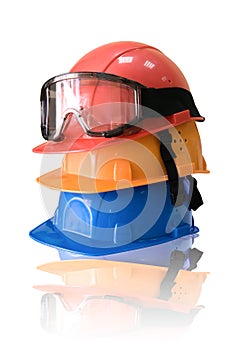 Many colored hardhats and goggles