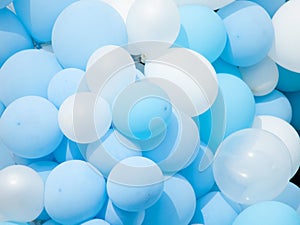 Many colorful balloons decorated wall background,