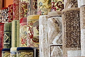 Many colorful carpets in the store. Carpet Rolls Shop Colourful Fabric decoration