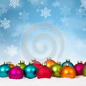 Many colorful Christmas balls baubles background decoration square snowflakes snow copyspace