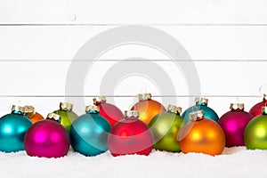 Many colorful Christmas balls wood wooden background decoration