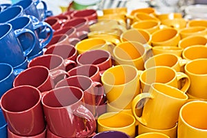 Many colorful empty ceramic cups