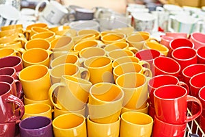 Many colorful empty ceramic cups