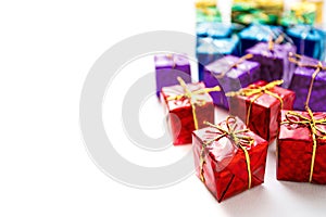 Many colorful gift boxes on white background