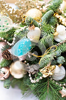 Many colorful lollipop on decorated Christmas tree, top view,balls, stars, cones, hearts, gold toys
