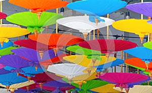 Many colorful mulberry paper umbrella decorated on the restaurant ,It is the art of the north;Khoa san Road,Bangkok,