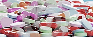 Many colorful pills, medicines. Pills supplements Background. Various pills and capsules as daily vitamins and supplements concept