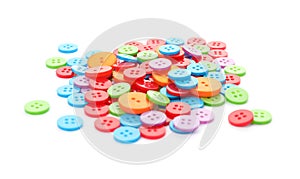 Many colorful plastic sewing buttons isolated