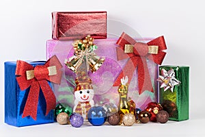Many colorful presents with luxury ribbons on white background.