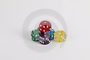 Colorful sparkling dices on the table