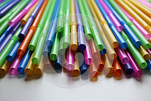 Many colorful straws as sign for heterogeneity or teamwork. photo