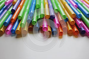 Many colorful straws as sign for heterogeneity or teamwork. photo