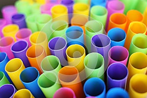 Many colorful straws as sign for heterogeneity or teamwork. photo