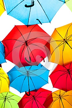 Many colorful umbrellas against the sky in city settings. Kosice, Slovakia