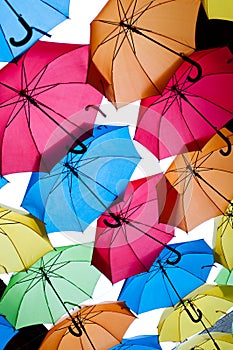 Many colorful umbrellas against the sky in city settings. Kosice, Slovakia