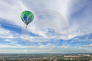 Many hot air balloons in the sky at blue sky with clouds background