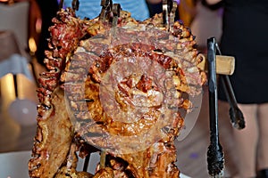 Many Cooking Traditional Turkish roasting lamb barbecues.Roasted meat over an open fire, cooked in a special way