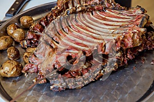 Many Cooking Traditional Turkish roasting lamb barbecues.Roasted meat over an open fire, cooked in a special way