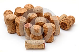 Many corks on the white background